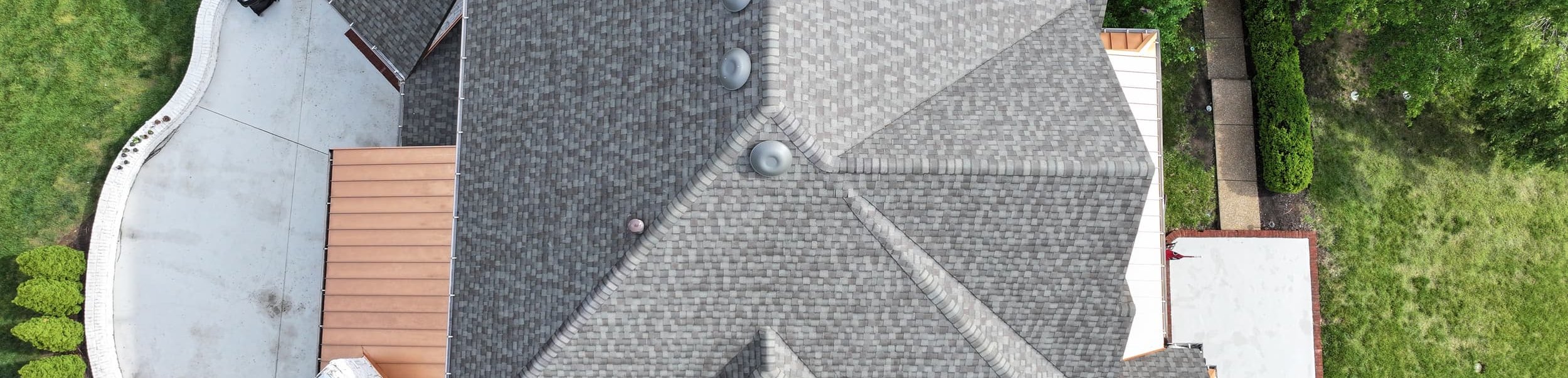 Sky view of neighborhood roofing.