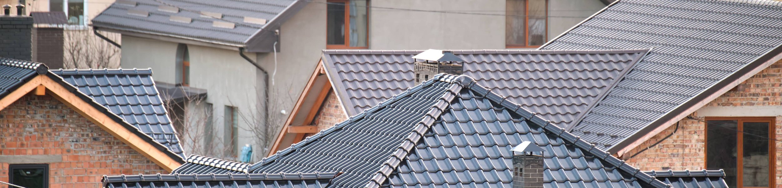 Sky view of neighborhood roofing.
